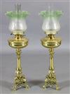 A pair of Victorian brass oil lamps, height without glass 21in.                                                                        