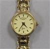 A lady's Rotary 9ct gold manual wind wrist watch, on a 9ct gold bracelet.                                                              
