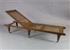 An early 19th century oak folding campaign day bed, L.6ft                                                                              