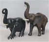 A carved ebony elephant and another                                                                                                    