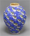 A large Studio pottery vase of ovoid form, decorated all over with fish swimming on a blue ground height 40cm                          