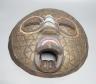 Two Japanese carved wood masks, an African beaded mask and three similar rattles                                                                                                                                            