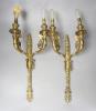 A pair of two branch ormolu wall lights with cherubs, height 42cm                                                                                                                                                           