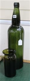 A large empty Sandemans port bottle and a dark olive green glass jar, 18th/19th century                                                