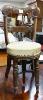 A regency brass inlaid mahogany music stool.                                                                                                                                                                                