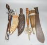 A replica flintlock pistol, machete, etc.                                                                                                                                                                                   