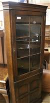 A glazed oak corner cupboard W.69cm                                                                                                    