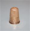 A cased French engraved 18ct yellow metal thimble, 22mm.                                                                               