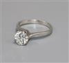 An 18ct white gold and solitaire diamond ring.                                                                                         