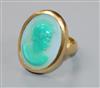 A 1950's 22ct gold and sardonyx set oval ring, carved with head of a Roman soldier to sinister, size K.                                