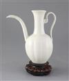 A Chinese white glazed ewer, Liao dynasty or later, 20cm high, repairs                                                                 