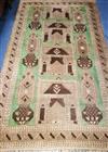 A green and brown Kilim rug 180 x 105cm                                                                                                