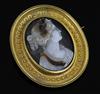 A Victorian gold mounted sardonyx oval cameo brooch, 46mm.                                                                             