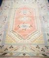 A Turkish carpet 230 x 198cm                                                                                                           