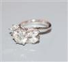 An 18ct white metal and single stone diamond ring, with marquise cut diamond set shoulders, size H/I.                                  