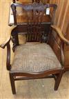 A mahogany elbow chair                                                                                                                 