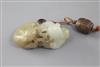 A Chinese pale celadon and pale russet jade group of two badgers and a cub, 18th/19th century, width 4.5cm                             