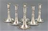 A set of four 18th century Swiss silver candlesticks, and two similar early 19th century silver candlesticks,                          