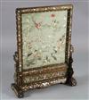 A Chinese embroidered silk, hongmu and mother of pearl framed table screen, c.1900, total size H.80cm W.62cm                           