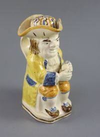 A Staffordshire Prattware 'Good Hearty Fellow' Toby jug with rare hat measure, c.1790-1800, 25cm high                                  