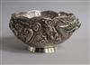 An early 20th century Japanese double skinned white metal bowl, decorated with a dragon, diameter 13.2cm.                              