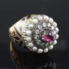 A 19th century French? gold and silver, cabochon garnet, split pearl diamond and black enamel circular dress ring, size M.             