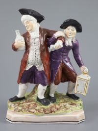 An Enoch Wood & Sons group 'The Vicar and Moses', c.1800-10, 24.5cm high                                                               