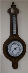 An inlaid aneroid barometer W.31.5cm                                                                                                   