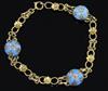 A 9ct gold, turquoise and diamond set fancy link bracelet, 19cm.                                                                       