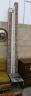 A 19th century painted carved oak door surround in three sections, aperture approximately width 260cm, height 250cm                                                                                                         