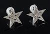 A modern pair of Theo Fennell 18ct white gold and diamond chip encrusted pierced double star design earrings,                          