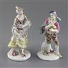 A pair of early Derby figures of a bagpiper and female companion, c.1756-7, h. 15.5cm and 16.5cm, bagpiper's neck repaired             