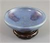 A Chinese Jun type purple-splashed dish, Qing dynasty, D. 12.5cm, wood stand, boxed                                                    