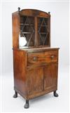 A Regency ebony and boxwood strung mahogany domed top secretaire cabinet, W. 2ft 5in. D. 1ft 8in. H. 5ft 6in.