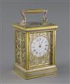 An early 20th century silvered and ormolu hour repeating carriage clock, H.6.25in.                                                     