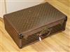 A Louis Vuitton suitcase, serial no. 809790, the lock stamped 076093, initialled JNP                                                   