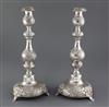A pair of late Victorian repousse silver Sabbath day candlesticks by Moses Salkind, 34.6cm.                                            
