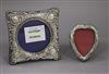 Two small silver mounted photograph frames, one heart shaped.                                                                          