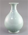 A Chinese celadon glazed bottle vase, yuhuchunping, Qianlong seal mark, perhaps Qing dynasty, H. 24.5cm, hairline crack to foot        