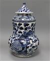 A Chinese blue and white jar and cover, Kangxi mark but late 19th century height 37cm                                                  