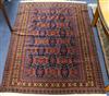 An Afghan blue ground rug 180 x 127cm                                                                                                  