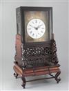 A 19th century Chinese hardwood mantel clock, 20in.                                                                                    