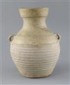 A Chinese pale green glazed jar, Han dynasty, H. 24.5cm                                                                                