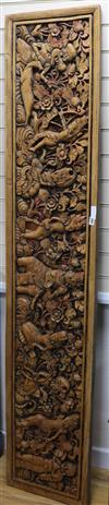 An Indonesian relief carved wood panel                                                                                                 