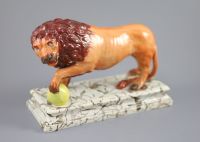 An Enoch Wood pearlware figure of a Medici Lion, c.1800-10, 28cm long                                                                  