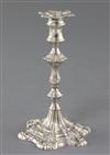 A George III cast silver taperstick by Ebenezer Coker, 5 oz.                                                                           