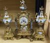 A French gilt metal and porcelain clock garniture clock height 42cm                                                                    