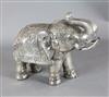 A large Indian white metal overlaid hardwood model of an elephant, length 33in. height 27in.                                           