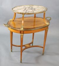 A late 19th century French satinwood, rosewood crossbanded and gilt metal mounted two tier oval etagere, W.3ft 4.5in. D.2ft H.3ft 3in. 