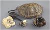 Two Japanese ivory netsuke and a turtle carapace pouch and netsuke, 19th century, carapace 10.7cm (3)                                  